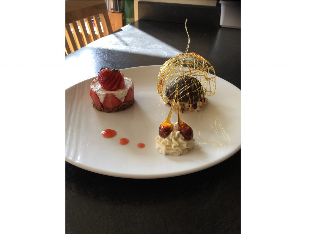 Mrs Fowler - Strawberry Mascapone Elderflower Cheesecake with Strawberry Coulis and Belgian Cholcoate and black cherry torte with hazelnut and almond pastory and caramalised hazlenuts